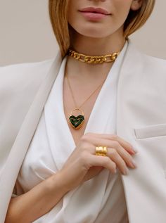 A talisman of love, handcrafted in 22k gold plated bronze and in colours good enough to eat. Luxury Heart-shaped Enamel Jewelry, Elegant Enamel Necklace With Heart Charm, Enamel Chain Necklace For Gift, Enamel Chain Jewelry As A Gift, Enamel Chain Jewelry For Gifts, Enamel Chain Jewelry As Gift, Love Locket, Green Lipstick, Deep Blue Sea