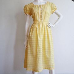 Bust: 42-44” Waist: 32-33” Hips: Free Length: 45” Excellent Condition, But Missing A Few Rhinestone Details In The Front Buttons. 1950s Style Yellow Vintage Dress For Spring, 1950s Style Vintage Yellow Dress For Spring, Yellow Vintage Dress 1950s Style For Spring, Yellow Vintage Dress, 1950s Style For Spring, Yellow Retro Vintage Dress For Garden Party, Retro Yellow Dress For Picnic, Yellow Vintage Summer Dress For Daywear, Yellow Vintage Dress For Summer Daywear, Yellow Vintage Short Sleeve Dress For Spring