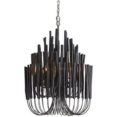 a chandelier made out of black sticks and metal rods on a white background