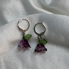 DETAILS: ⋆ ˚｡⋆୨୧˚ adorable purple flower earrings with leaves recommend taking them off before swimming or showering  ᰔ PACKAGING: *The earrings come in a cute organza bag packed inside a bubble packaging bag *There are also some stickers and a little note for you in the package SHIPPING & PROCESSING: *Orders will be shipped from Rhineland-Palatinate via DHL with non-insured shipping (contact me if you want insured shipping but it'll cost more then), I don't assume any liability for lost packages If you have further questions or there's anything wrong with the item you ordered, don't hesitate to contact me Trendy Purple Flower Earrings For Gift, Purple Flower Earrings With Ear Wire As Gift, Purple Flower Earrings With Ear Wire For Gift, Trendy Lavender Earrings For Gift, Adjustable Purple Flower Earrings As Gift, Adjustable Purple Flower Earrings For Gift, Purple Flower Charm Earrings, Cute Flower Charm Earrings As Gift, Cute Flower Charm Earrings For Gift