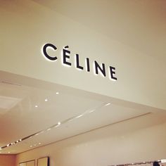 a store front with the name celine on it's sign above the counter