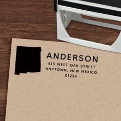 a rubber stamp with the word anderson on it