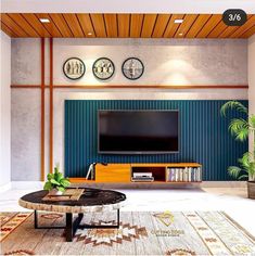 a living room filled with furniture and a flat screen tv mounted on a wall above a wooden coffee table