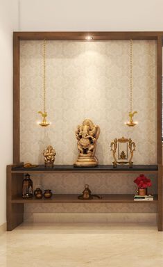 a shelf with some statues on it in the middle of a room that is white and tan