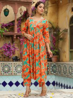 This is beautiful 2-piece set. The set comes with floral print kurta has V-neck, 3/4th sleeves and calf length teamed with printed trouser pant. 2-piece set Color-Orange Work - Floral Print Detailing Kurta Fabric-Cotton Kurta Length - 46 inch Sleeves- 3/4th Sleeves Sleeves Length - 17inches Neck-V Neck Bottom Fabric - Cotton Bottom Length - 38 inch Care-Dry Clean or Hand wash DISCLAIMER - The color of the product may be differ due to screen settings of device. A misprint here and a color drop sl A Line Kurta, Cotton Kurta, Cotton Bottoms, Womens Size Chart, Trouser Pants, Fabric Cotton, Color Orange, Orange Color, 2 Piece