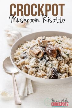 a white bowl filled with rice covered in mushrooms and parmesan