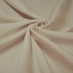 a close up view of a plain white fabric