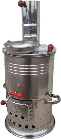 a large metal pot sitting on top of a stove