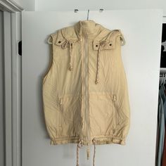 Nwot Color Is A Creamish/Yellow Cream Utility Vest, Tan Utility Vest, Khaki Utility Windbreaker With Double-lined Hood, Yellow Hooded Windproof Windbreaker, Yellow Hooded Waterproof Windbreaker, Free People Jacket, Cream Yellow, Hooded Vest, Fp Movement