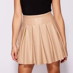 Nude Faux Leather Vegan Leather High Waist Pleated Mini Skater Skirt Faux Leather High Waist Pleated Mini Skater Length Is 16 Inches 97% Polyester, 3% Elastane Made In Italy Also Available In Black New With Tag Size Xs = 0-2 Model Is Wearing Size S If You Have Any Questions, Please Let Me Know Thank You For Stopping By My Boutique To Read Reviews; Go To My Boutique Page By Clicking On My Username, Then Click On About And Then Scroll To Received Love Notes Skater Skirt, Mini Skirt, High Waist Ski Skirt Party Outfit, Leather Skater Skirts, Mini Skater Skirt, Beige Skirt, Skirt High Waist, Faux Leather Mini Skirt, Skirt Mini, Faux Leather Skirt, Leather Mini Skirts