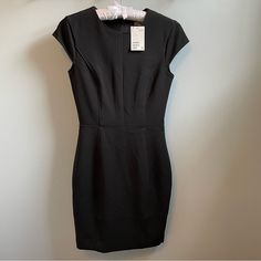 Classic Little Black Sheath Dress By H&M Lined Piping Detail Size 2 French Girl Style Great Addition To A Capsule Wardrobe Cocktail Dress Business Office Attire Lbd Approximately Length 35.5” Waist 12.75” Lined Stretch Mini Dress For Work, Stretch Lined Mini Dress For Work, Stretch Lined Dresses For Work, Fitted Sheath Mini Dress For Work, Black Mini Dress With Back Zipper For Work, Black Sheath Midi Dress With Back Zipper, Black Sheath Bodycon Dress For Work, Fitted Black Mini Dress For Work, Black Bodycon Dress With Back Zipper For Work