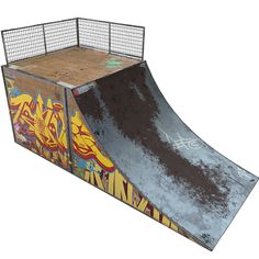 a skateboard ramp with graffiti painted on it's sides and the bottom half