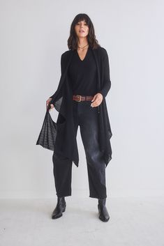 This timeless and versatile cardigan is the perfect layering piece. You can easily dress her up and down for effortless elegant lounging, power meetings and anything in between. Relaxed, drapey fit Long sleeves, fitted in the arms Hits at the knee Tapered hemline Stretchy fabric Edgy Minimalist, Versatile Cardigan, Fall Lookbook, Fall Items, Twill Pants, Fashion Help, Black Cardigan, Layering Pieces, Personal Stylist