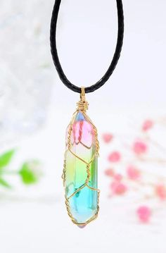 Although man-made, it is associated with the divine and ethereal realm. Meditating with the crystal can provide a calming, soothing, and awareness-opening effect to the mind and body Luxury Keychain, Rainbow Aura Quartz, Geometric Diamond, Colourful Necklace, Aura Quartz, Crystal Necklace Pendant, Quartz Necklace, Diamond Crystal, Necklace Sizes