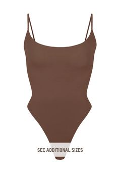 High Cut Bodysuit With Built-in Bra, Seamless Second-skin Bodysuit With Low Back, Chic Seamless Bodysuit With Tank Straps, Chic Seamless Camisole Bodysuit, Seamless Second-skin Leotard With Scoop Back, Seamless Bodysuit With Minimal Stretch And Low Back, Seamless Low Back Bodysuit With Minimal Stretch, Sleek Seamless Bodysuit With Scoop Back, Low Back Seamless Bodysuit With Minimal Stretch