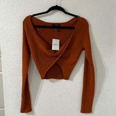 Forever 21 Rust Color Long Sleeve Crop Top Women’s Size L. Size Large But Fits A Women’s Small Best, Super Cute Color, No Flaws, Never Worn, Has Stretch, Twist Detail In Front, Nwt! Measurements: P2p: 16” Length: 18” (Shoulder To Back Hem) Trendy V-neck Crop Top For Fall, Trendy Forever 21 Crop Top For Fall, Fall Trendy V-neck Crop Top, Fall Crop Top For Day Out, Chic Forever 21 Tops For Winter, Fitted Crop Top For Fall Day Out, Fitted Crop Top For Day Out In Fall, Stretch Crop Top For Date Night In Fall, Forever 21 Casual Crop Top For Date Night