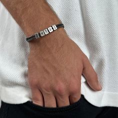 "This simple and beautiful stylish men's stainless steel bracelet comes with with 5 custom stainless steel beads, each with an inscription of its own. The bracelet comes with 5 beads, you can decide which to personalize and the rest will remain empty. ITEM DETAILS: * Waterproof and Sweatproof. * Font color: Black * Bracelet length: 7\" (18cm). * Bracelet comes with a 2\" (5 cm) extension chain. * Please mention your font preference when ordering Every purchase comes packaged in a sweet box. It c Personalized Stainless Steel Name Bracelet As A Gift, Personalized Stainless Steel Name Bracelet, Personalized Stainless Steel Bracelet With Custom Name, Modern Bracelets For Father's Day Gift, Modern Bracelet For Father's Day Gift, Personalized Adjustable Sterling Silver Bracelet, Personalized Name Bracelet In Stainless Steel, Adjustable Stainless Steel Chain Bracelet For Friendship, Personalized Stainless Steel Bracelet With Name