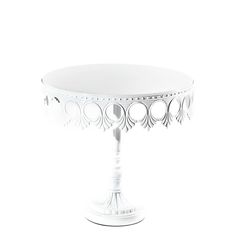 a white cake stand on a white background