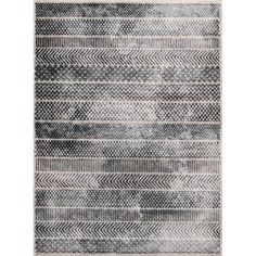 a gray and white rug with an abstract design