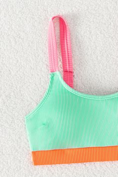 Get ready to stand out in the sun with our Rib Neon Colorblock Scoop Neck Top & Hipster Bikini Set! The bright and bold colors will have you feeling confident and vibrant all day long. The ribbed texture and scoop neck top add a touch of retro flair, while the hipster bikini bottoms provide the perfect balance of comfort and style. Soak up the sun and enjoy the beach in this playful and trendy set! Product code: CAA12C3H077PP Features:  Scoop neck Removable cups Medium bust support Wide stra Fun Multicolor Tankini For Beach, Fun Multicolor Tankini For Vacation, Fun Multicolor Tankini For Beach Season, Fun Multicolor Tankini For Poolside, Playful Multicolor Tankini For Sunbathing, Fun Multicolor Tankini For Swimming, Trendy Multicolor Swimwear With Adjustable Straps, Sporty Multicolor Tankini For Summer, Color Block Swimwear For Sunbathing In Spring