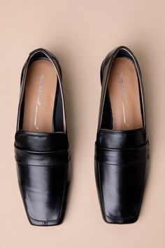 The Intentionally Blank Pinky Black Leather Square-Toe Loafer Flats have an understated chicness that makes them essential for creating effortlessly sophisticated looks! Sleek and smooth genuine leather creates a loafer-inspired silhouette with an exaggerated square-toe upper and a notched vamp with matching strap detail. The slip-on design makes these the perfect choice for everyday styling! Available in Euro sizes only. 0. 75" rubber heel. Lightly cushioned insole. Rubber sole has nonskid mark Classic Evening Flats, Sleek Slip-on Formal Flats, Sleek Leather Loafers For Office, Classic Pointed Toe Loafers For Business, Classic Pointed Toe Loafers For Semi-formal Occasions, Sleek Evening Loafers With Leather Sole, Sleek Square Toe Loafers For Formal Occasions, Sleek Formal Loafers With Square Toe, Elegant Pointed Toe Formal Flats