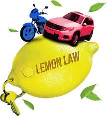 two cars on top of a lemon with the words lemon law