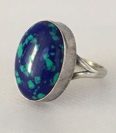 Vintage Sterling Silver Azurite Ring Marked Sterling L by VintageBlingEtc on Etsy Blue Opal Ring With Natural Stones, Blue Untreated Oval Rings, Elegant Untreated Blue Turquoise Ring, Elegant Blue Turquoise Ring, Unique Blue Opal Round Ring, Blue Oval Opal Ring With Natural Stones, Modern Blue Turquoise Gemstone Ring, Blue Untreated Round Turquoise Ring, Blue Cabochon Rings