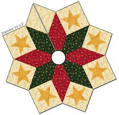 an image of a star quilt pattern on a white background with red, green and yellow stars