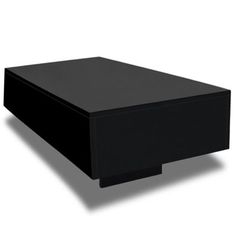 a black box sitting on top of a white surface