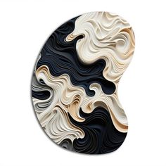 a black and white abstract design on a circular object with wavy lines in the center