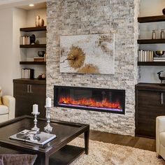 a living room with two couches and a fireplace