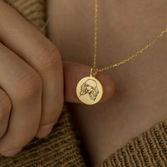 "* Material: High Quality 14K Solid Gold - Not Gold Filled Not Gold Plated - ( REAL GOLD )  * Metal Stamp: 14k * Dimensions: Varies between 12.5mm and 25mm depending on your selection * All our jewelry is custom made by hand with Love and Care in our workshop ♡ * Real 14k Solid Gold Poodle Dog Necklace - Custom Pet Portrait Pendant - Pet Memorial Gift - Dainty Pet Jewelry - Best Friend By Demir Uluer H O W ∙ T O ∙ O R D E R * You can choose the size and gold color of your pendant using the first box / option * You can choose the length of your chain by selecting the second option / box. Just use the 'PERSONALIZATION BOX' to let us know the Note you want on the back of your Pendant O T H E R ∙ I N F O R M A T I O N * Material of chain: 14K Solid gold ( REAL GOLD ) It is thin and dainty and Minimalist Gold Dog Tag Necklace, Dog Memorial Necklace, Dog Print Necklace, Personalized Gold Dog Tag Charm Necklace, Dog Pendant Necklace, Real Gold Necklace, Dog Necklace, Solid Gold Necklace, Pet Memorial Gifts