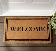 a welcome mat with the word welcome on it next to a doormat that reads,'welcome '