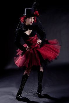 a woman in a red and black costume