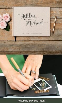 the wedding stationery is set up on top of a wooden table with flowers and pen