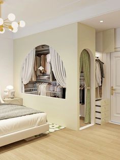 a bedroom with a bed, mirror and closet