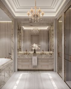 an elegant bathroom with chandelier and marble walls