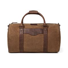 Smoke/Brown Classic Cognac Travel Bag For Everyday, Classic Brown Travel Bag With Luggage Sleeve, Classic Rectangular Travel Bag With Waxed Finish, Classic Cognac Weekender Bag With Leather Handles, Elegant Brown Large Capacity Weekender Bag, Elegant Large Capacity Brown Weekender Bag, Brown Waxed Canvas Weekender Bag With Large Capacity, Classic Brown Duffle Bag For Travel, Timeless Brown Travel Bag