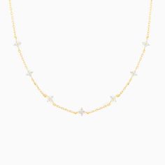 See things clearly in our Shimmer Blossom Necklace. Adorned with sparkling CZs, this necklace is the perfect accessory for day and night. 18k gold plated, 18k rose gold plated, or rhodium plated over brass with a protective coating Cubic zirconia stones 13" chain with a 2" extension, 5mm clusters width Shop the entire Blossom Collection here! Dainty Sparkling Necklace For Party, Dainty White Necklace With Sparkling Stones, Dainty Diamond White Necklace With Sparkling Stones, Delicate Cubic Zirconia Necklace With Sparkling Stones, Delicate Necklace With Sparkling Cubic Zirconia, Delicate Diamond Necklace With Sparkling Detail, Party Rose Gold Charm Necklace With Delicate Chain, Dainty Sparkling Crystal Necklaces, Dainty Sparkling Crystal Necklace