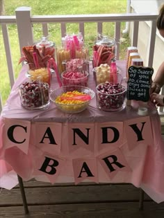 a candy bar is set up on the porch