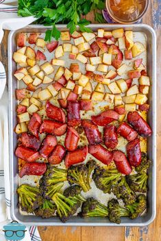 a casserole dish with strawberries and broccoli