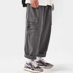 Experience timeless style and versatility with our Classic All-Match Straight-Leg Cargo Pants. Made with high-quality materials, these pants offer a comfortable fit and effortless elegance. With their straight-leg design and functional cargo pockets, they are perfect for any occasion. Elevate your wardrobe with this luxurious and essential piece. Features: -85% Cotton,15% Polyester -Mid-rise waist -Multi-Pockets -Regular Fit -Japanese style Techwear Wide Leg Cargo Pants With Patch Pockets, Wide-leg Work Pants With Cargo Pockets For Streetwear, Techwear Wide Leg Bottoms With Patch Pockets, Techwear Ankle-length Cargo Pants, Techwear Cotton Cargo Pants With Flap Pockets, Solid Wide Leg Cargo Pants With Patch Pockets, Streetwear Straight Cargo Pants With Patch Pockets, Straight Cargo Pants With Patch Pockets For Streetwear, Techwear Wide Leg Cargo Pants For Work