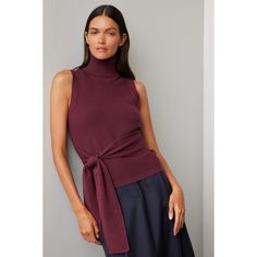 Purple knit (72% Rayon, 28% Polyester). Sweater. Sleeveless. Turtleneck. Pull on. 21" from shoulder to hemline. Imported. Elegant Tank Top For Fall, Chic Winter Vest Tops, Fall Sleeveless Fine Knit Tank Top, Chic Turtleneck Knit Tank Top, Chic Knit Turtleneck Tank Top, Elegant Vest Tops For Fall, Chic Fitted Sweater Vest For Fall, Sleeveless Fine Knit Top, Chic Fall Tank Knit Top