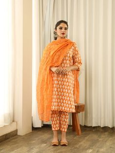 Anita - Orange Mirror Embroidered Printed Kurta Set (Set of 3) By Gulabo Jaipur now available at Trendroots Designer Cotton Unstitched Suit With Straight Kurta, Designer Cotton Kurta With Dupatta, Designer Cotton Lawn Suit With Chikankari Embroidery, Designer Unstitched Cotton Salwar Kameez, Festive Cotton Lawn Suit With Straight Kurta, Cotton Lawn Suit With Straight Kurta For Festive Season, Cotton Salwar Kameez With Dupatta, Unstitched Cotton Anarkali Set, Cotton Palazzo Set With Dupatta