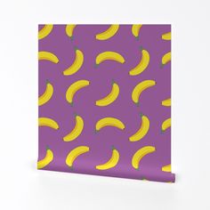 a purple background with yellow bananas on it