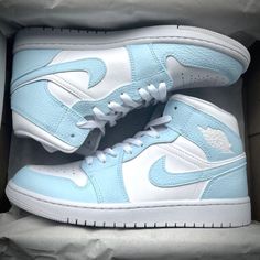 Walk on air in the light blue Custom Air Jordan 1s! This bold style commands attention with its light blue hue, inviting you to take risks and experience life's thrills. Conquer any challenge and make a statement: the sky is the limit! 🤩 Exactly as shown in the pictures. 📷 Brand New & Authentic. 💯 Hand Painted with attention to detail. 👨‍🎨 Waterproof and Flexible. ❤️ Unisex model. Please refer to the Size Chart. 👟👫 Free Worldwide Shipping. ✈️🌍 Air Jordan 1 Custom, Jordan 1 Custom, Blue Air Jordan 1, Custom Air Jordan 1, Jordan Shoes Girls