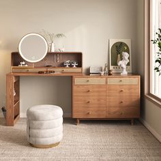 a desk with a mirror and stool in a room