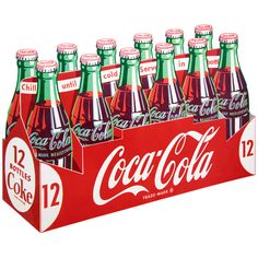 a red and green coca cola box filled with 12 bottles