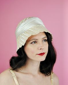 An absolutely stunning hat that is sure to take everyones breath away! The beautiful bell shape gives a very cloche-like look. The hat is made of a lovely cream felted wool with a beautifully detailed scalloped rim. It has been intricately stitched with sequins throughout the brim and the top. The crown has a pleated ribbon around it. The label is for "Murriel". I will be honest, the label has thrown me a bit of a curve ball in terms of dating. While the hat and label itself suggest the hat belongs to the 1940s, the only comparison hat I found with the same label was most defiantly mid-century. This could mean the company just didn't change its label over for a decade... whose to say. Regardless of the date, it is absolutely beautiful.  FREE SHIPPING! Measurements: Interior circumference: Cloche Hats, Wool Winter, Cloche Hat, Felted Wool, Dress Form, Be Honest, 1950s Vintage, Hat Sizes, Wool Felt