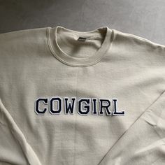 This Cowgirl Sweatshirt in this trendy beige colored sweatshirt is perfect for cozy winter days or something to just lounge around the house! This is also perfect to give to your loved ones as a gift! They come in brown and beige. - These embroidered texts (patches) are heat pressed. - All our sweatshirts run a UNISEX fit. They are naturally oversized, but if you like a more baggy look, we recommend sizing up. - Super soft and comfy! ♡ - Please note that crewneck brand used may vary depending on Butterfly Crewneck, Mom Dad Baby, Mini Outfit, Trendy Crewneck, Colorful Sweatshirt, Brown Sweatshirt, Hospital Outfit, Cowgirl Shirts, College Sweatshirt